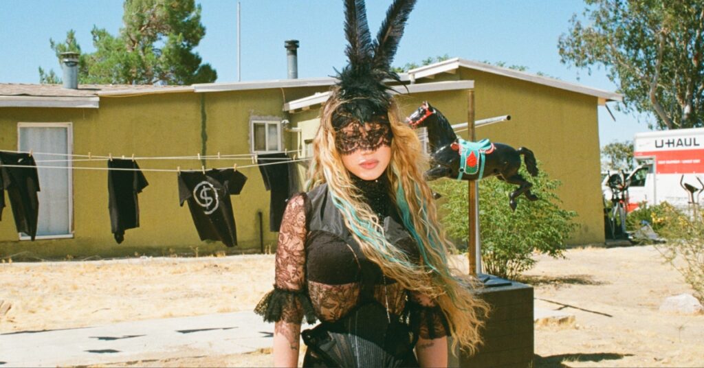 Watch Slayyyter mourn a past love in “brand new chanel$” video Watch Slayyyter mourn a past love in “brand new chanel$” video